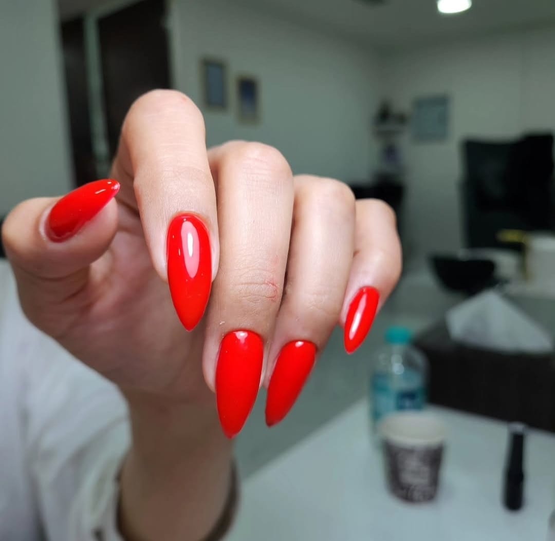 Woman receiving a manicure at home
